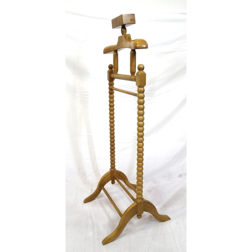 138 - Timber valet stand with shaped top, ball turned column, hipped legs