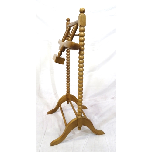 138 - Timber valet stand with shaped top, ball turned column, hipped legs