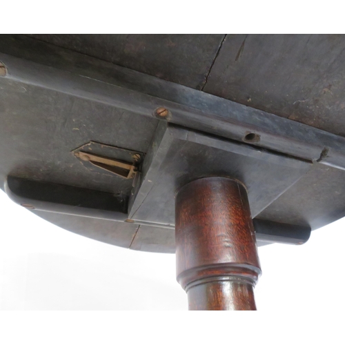 139 - Victorian mahogany occasional table with tip-up round top, vase turned column, on hipped tripod