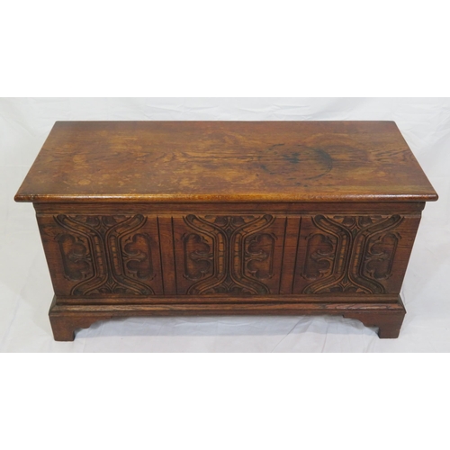 141 - Arts & Crafts style oak coffer with carved panelled sides & bracket feet