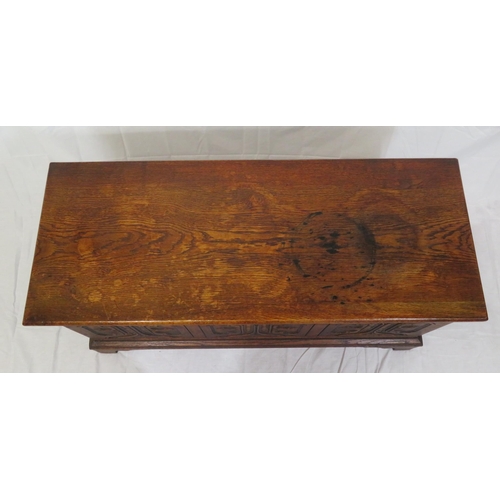 141 - Arts & Crafts style oak coffer with carved panelled sides & bracket feet