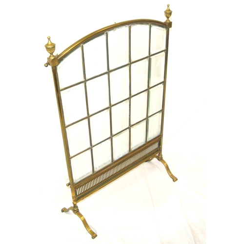 162 - Edwardian brass framed meshed firescreen with bevelled glass insets, on bracket feet