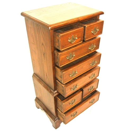 170 - Edwardian design oak small tallboy chest of 4 short & 5 long drawers with brass drop handles, on bra... 