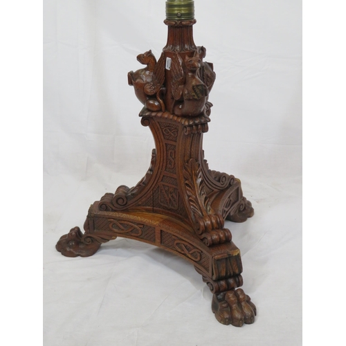 173 - Pugin style brass & timber garment stand with adjustable top, carved gargoyles with shields, on shap... 