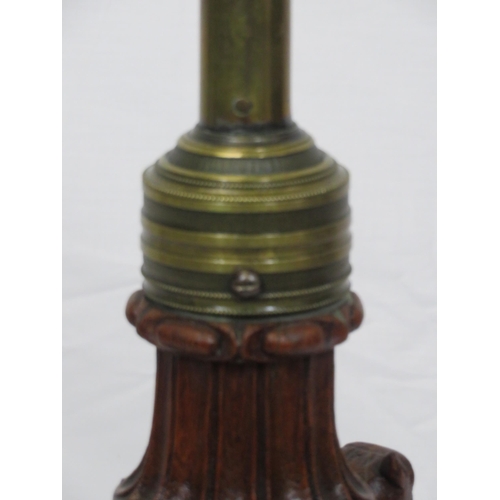 173 - Pugin style brass & timber garment stand with adjustable top, carved gargoyles with shields, on shap... 