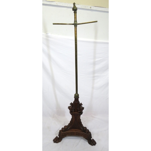 173 - Pugin style brass & timber garment stand with adjustable top, carved gargoyles with shields, on shap... 