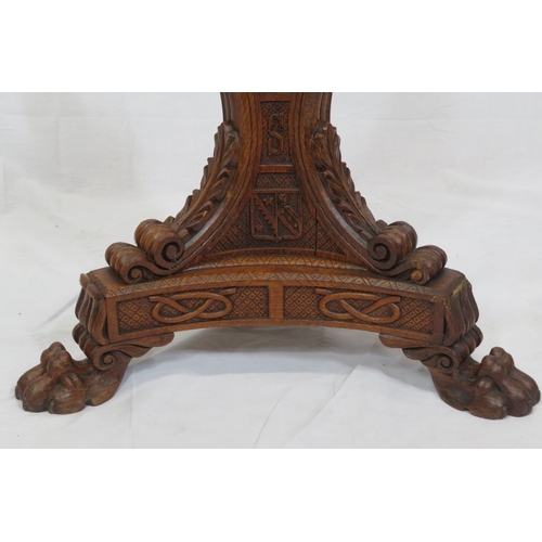 173 - Pugin style brass & timber garment stand with adjustable top, carved gargoyles with shields, on shap... 