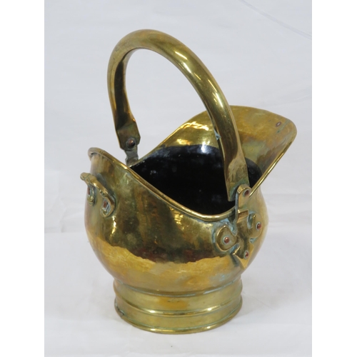 178 - Small Victorian brass helmet-shaped fuel bucket with shaped handles