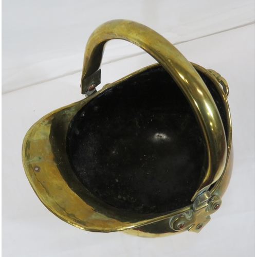 178 - Small Victorian brass helmet-shaped fuel bucket with shaped handles