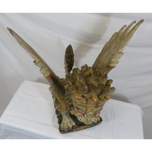 188 - Oriental carved timber temple dragon, ornately carved & with painted decoration, on shaped base