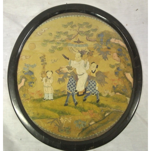 21 - Oriental school 'Mythical scene with figures and dragon' oval silkwork 35x32cm