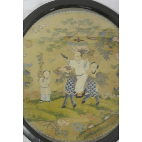 21 - Oriental school 'Mythical scene with figures and dragon' oval silkwork 35x32cm