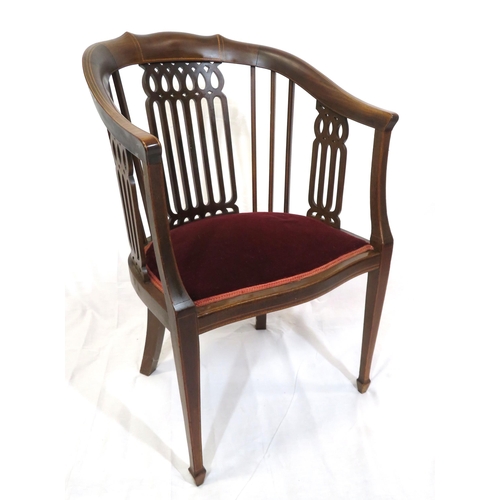 388 - Edwardian inlaid mahogany bowed tub chair with pierced splats, serpentine fronted seat, on tapering ... 