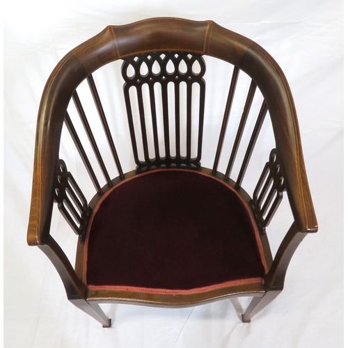 388 - Edwardian inlaid mahogany bowed tub chair with pierced splats, serpentine fronted seat, on tapering ... 