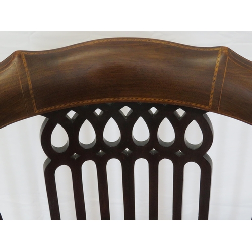 388 - Edwardian inlaid mahogany bowed tub chair with pierced splats, serpentine fronted seat, on tapering ... 