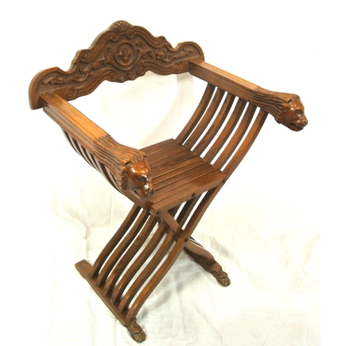 393 - Folding teak directors chair with lion head arms