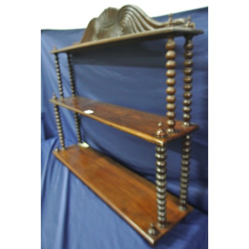 108 - Edwardian design three tier shelf unit of graduating sizes, with scroll back & turned columns