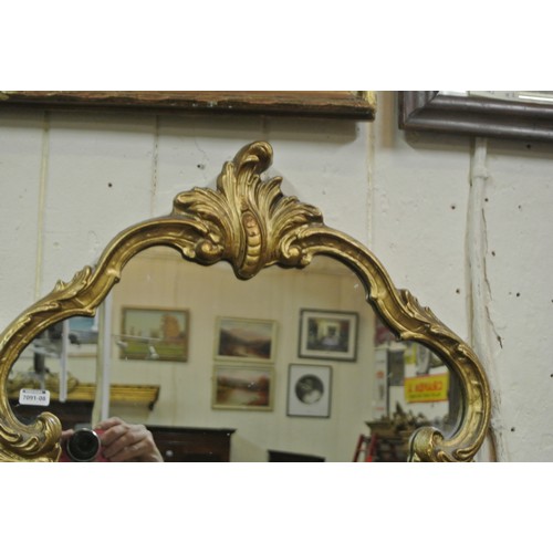 153 - Regency design gilt framed shaped wall mirror with scroll decoration H77 x 45 cm