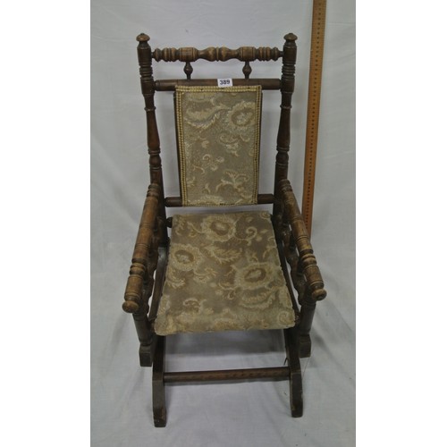 389 - Victorian childs rocking armchair with turned rails & arms, on bracket feet