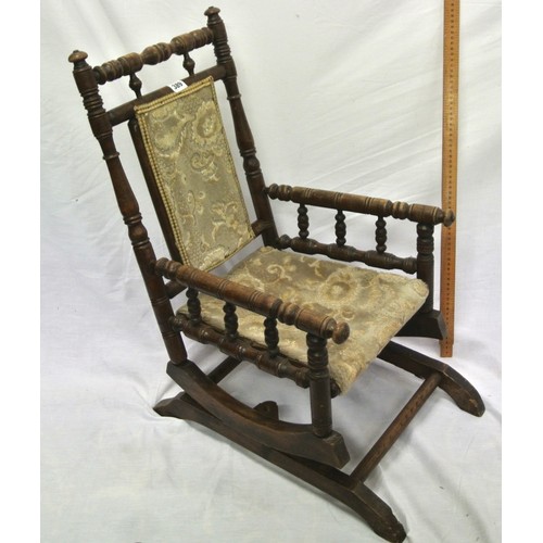 389 - Victorian childs rocking armchair with turned rails & arms, on bracket feet