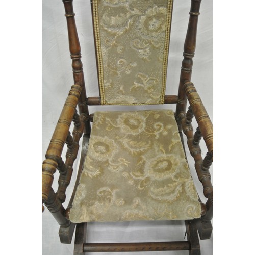 389 - Victorian childs rocking armchair with turned rails & arms, on bracket feet