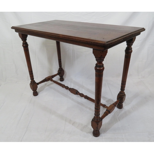 56 - Victorian mahogany oblong occasional table with turned columns & stretcher, on round feet