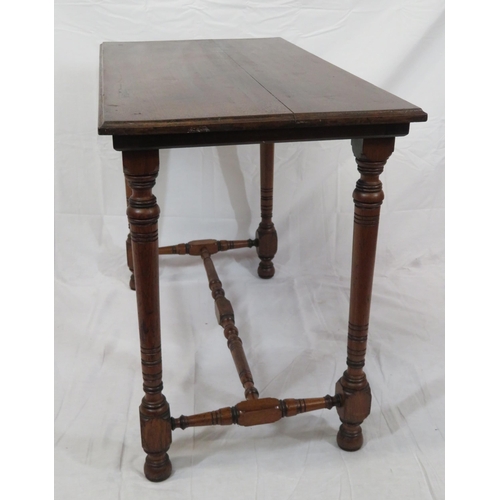 56 - Victorian mahogany oblong occasional table with turned columns & stretcher, on round feet