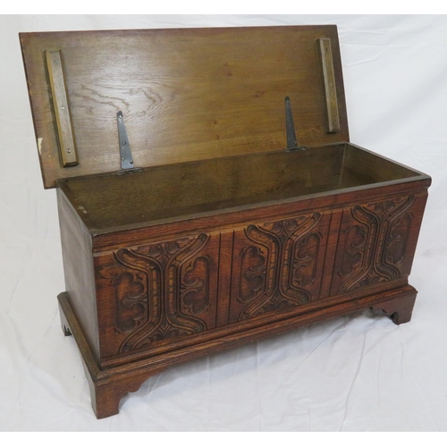 64 - Arts & Crafts style oak coffer with carved panelled sides & bracket feet