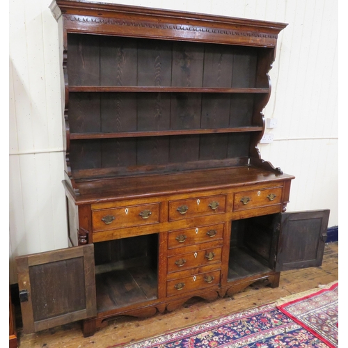 70 - Victorian oak dresser with dentil frieze, shelved back with plate rails, numerous drawers & presses ... 