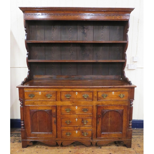 70 - Victorian oak dresser with dentil frieze, shelved back with plate rails, numerous drawers & presses ... 