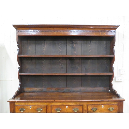 70 - Victorian oak dresser with dentil frieze, shelved back with plate rails, numerous drawers & presses ... 