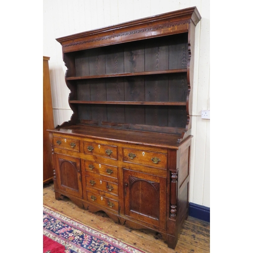 70 - Victorian oak dresser with dentil frieze, shelved back with plate rails, numerous drawers & presses ... 