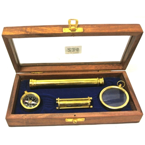 164 - Mariners brass presentation set in glass topped presentation  case