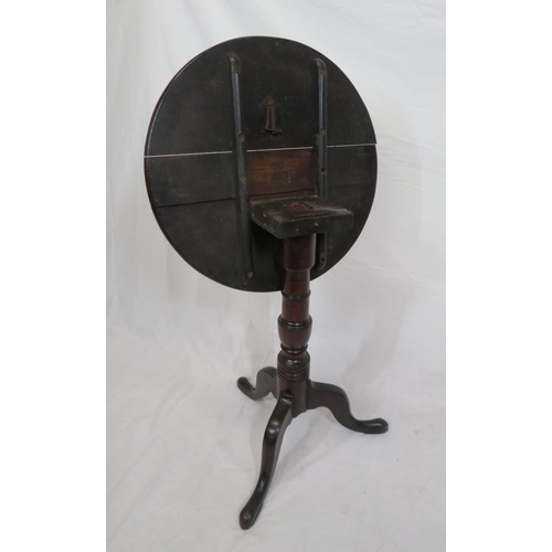 211 - Victorian mahogany occasional table with tip-up round top, vase turned column, on hipped tripod