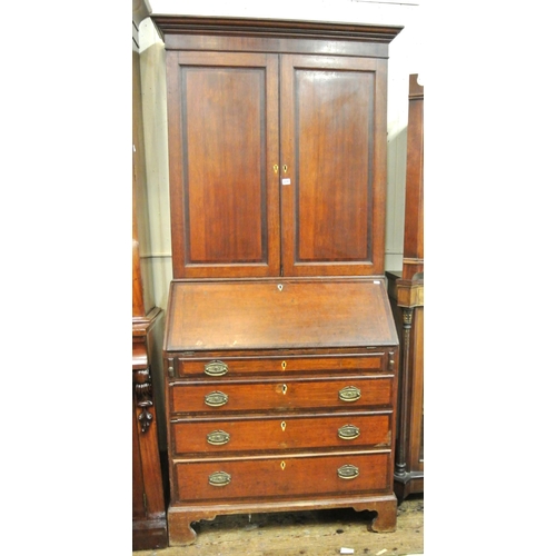 245 - Georgian crossbanded oak bureau bookcase, the top with panelled doors & shelved interior, drop-down ... 