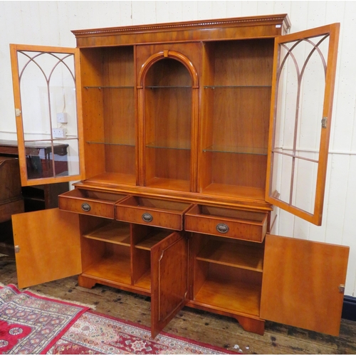 285 - Edwardian design yew & walnut bookcase with doors, glass shelving , three frieze drawers with oval d... 