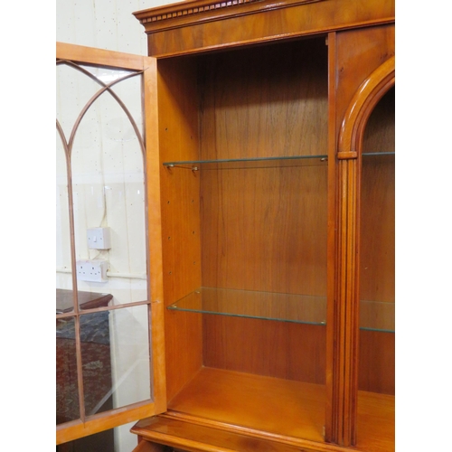 285 - Edwardian design yew & walnut bookcase with doors, glass shelving , three frieze drawers with oval d... 