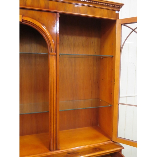 285 - Edwardian design yew & walnut bookcase with doors, glass shelving , three frieze drawers with oval d... 