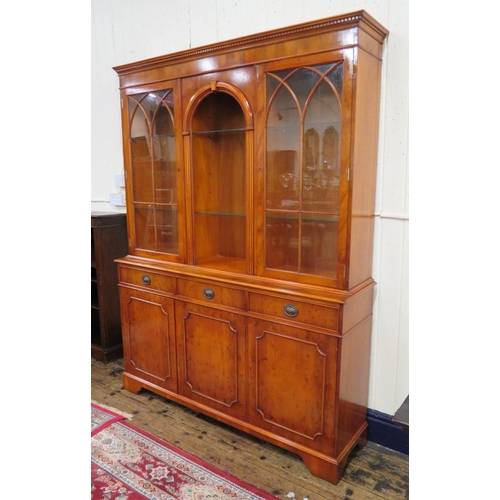 285 - Edwardian design yew & walnut bookcase with doors, glass shelving , three frieze drawers with oval d... 