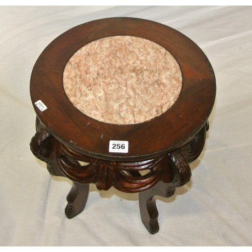 290 - Carved Oriental teak stool or stand with rouged marble inset, foliate carving, on shaped legs with s... 