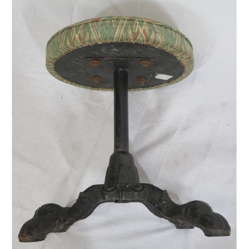 291 - Victorian style cast iron stool with round upholstered top, foliate decorated base