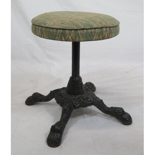 291 - Victorian style cast iron stool with round upholstered top, foliate decorated base