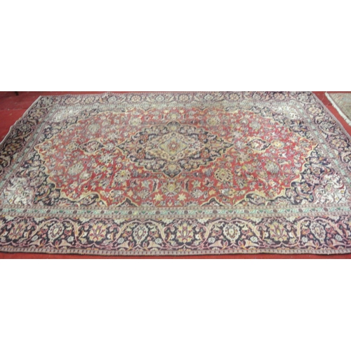 103 - Red ground Persian Kashan carpet with floral medallion design 333x225