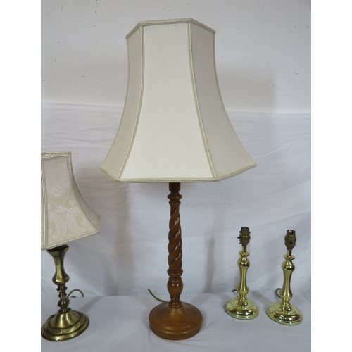 128 - Pair of brass electric lamps, single brass electric lamp, & timber lamp