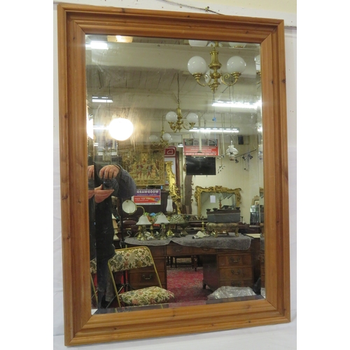 132 - Pine framed bevelled glass wall mirror108x78cm