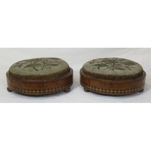 137 - Pair of Georgian inlaid mahogany round footstools with foliate needlepoint, with string and foliate ... 