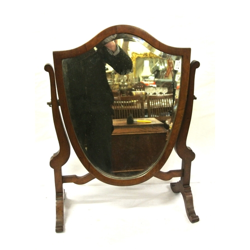 139 - Edwardian mahogany framed heart shaped bevelled swivel mirror with shaped columns, on bracket feet