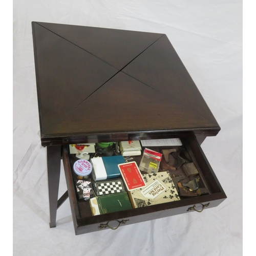 140 - Edwardian mahogany envelope card table with swivel top, counter wells, frieze drawer with brass hand... 