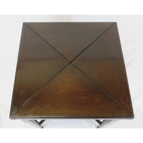 140 - Edwardian mahogany envelope card table with swivel top, counter wells, frieze drawer with brass hand... 