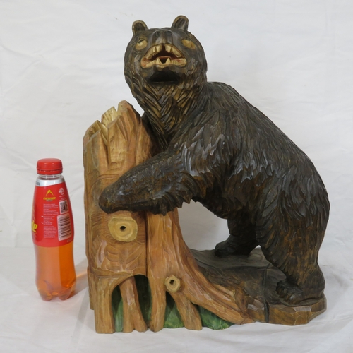 143 - Austrian style carved timber figure of a Black Forest bear by a tree